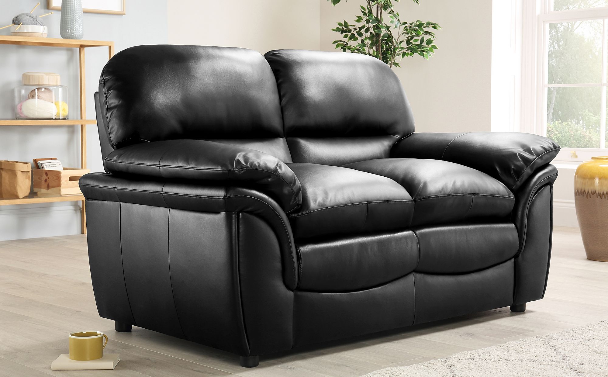 2 seater leather sofa beds uk