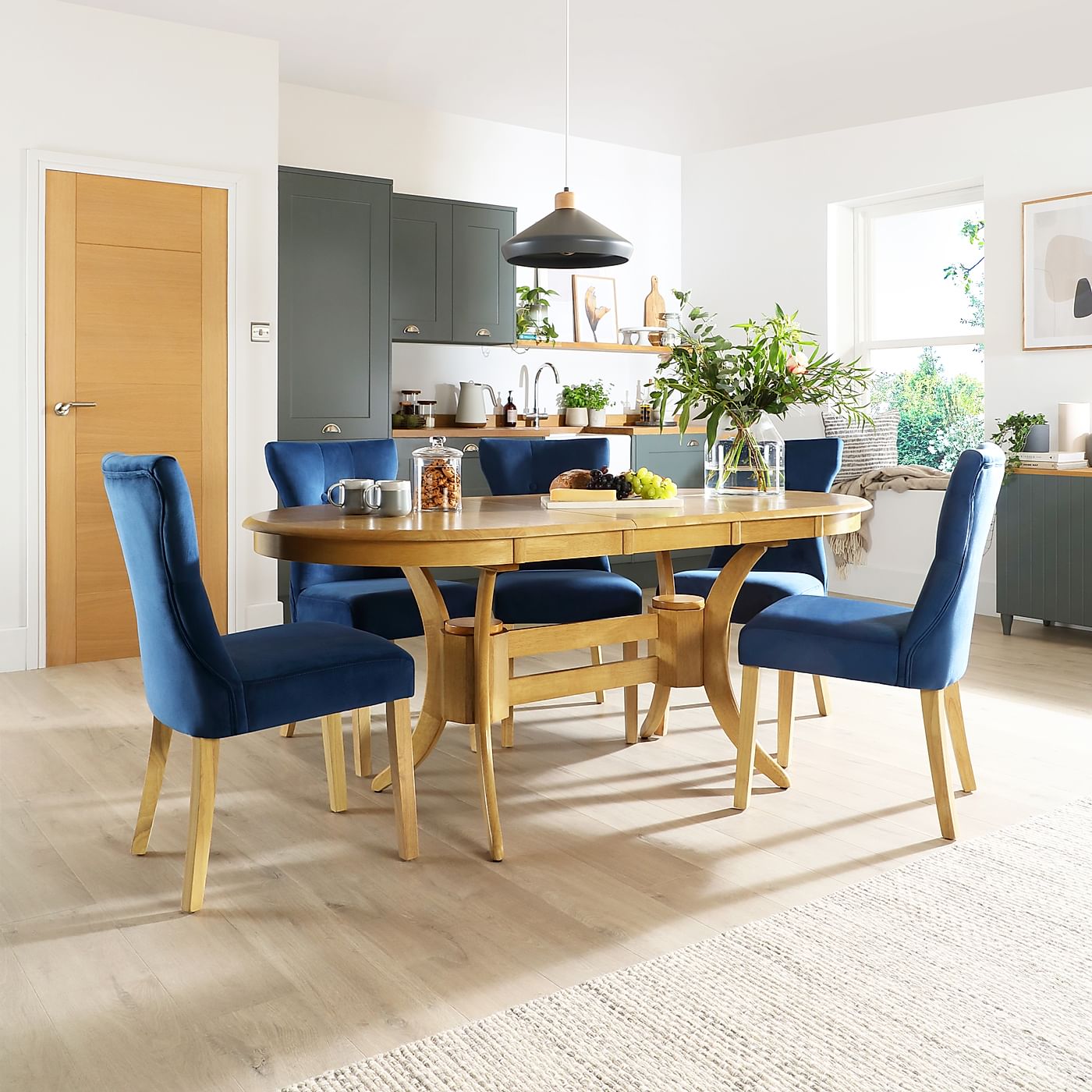 Townhouse Oval Oak Extending Dining Table with 6 Bewley Blue Velvet Chairs Furniture Choice