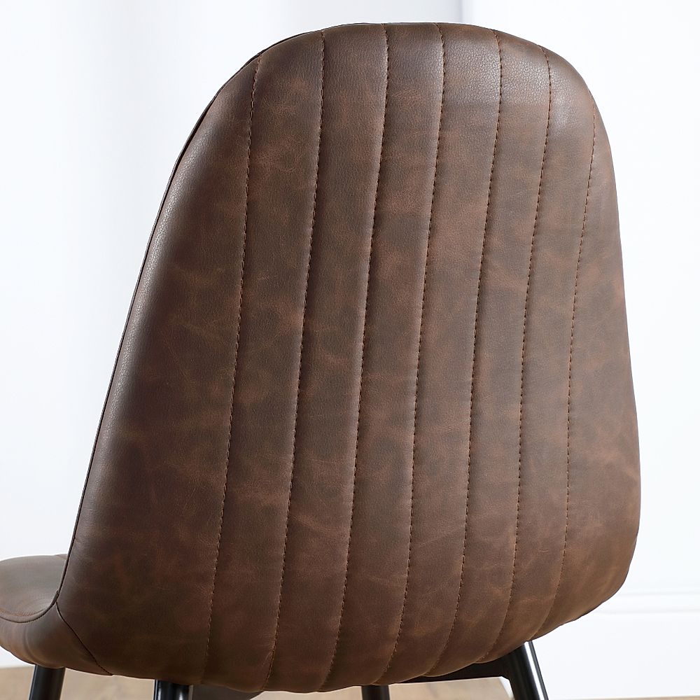 Brown leather chair with black legs deals