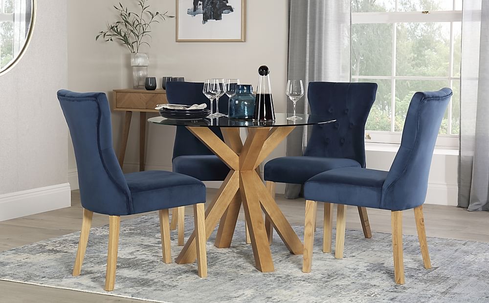 Hatton Round Dining Table & 4 Bewley Chairs, Glass & Natural Oak Finished Solid Hardwood, Blue Classic Velvet, 100cm
