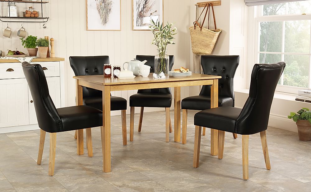 Milton Dining Table & 4 Bewley Chairs, Natural Oak Finished Solid Hardwood, Black Classic Faux Leather, 120cm
