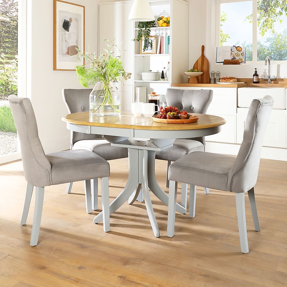 Hudson Round Extending Dining Table & 6 Bewley Chairs, Natural Oak Finish &  Grey Solid Hardwood, Grey Classic Velvet, 90-120cm Only £749.99