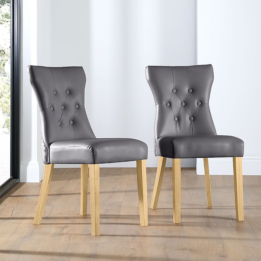 Hudson round oak extending dining table with 4 bewley clearance slate chairs