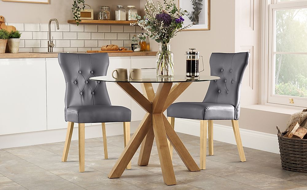 Hatton Round Dining Table & 2 Bewley Chairs, Glass & Natural Oak Finished Solid Hardwood, Grey Classic Faux Leather, 100cm