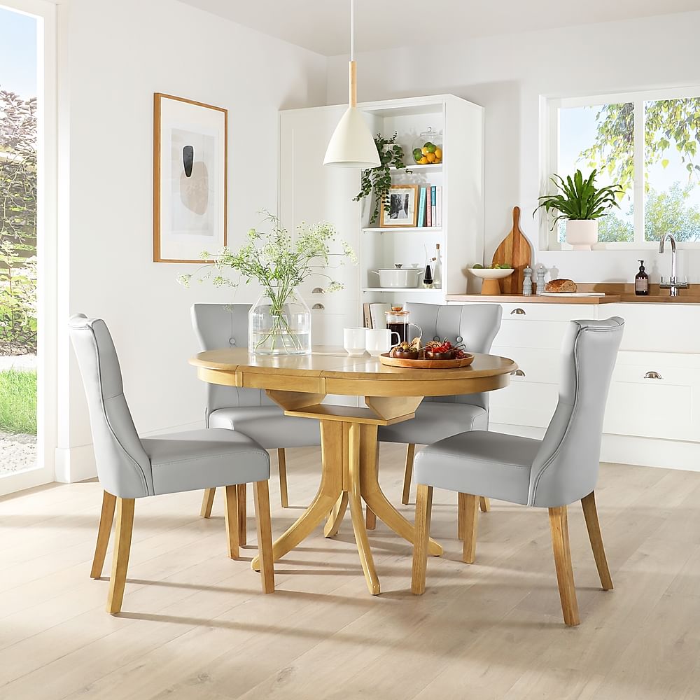 Hudson Round Extending Dining Table & 4 Bewley Chairs, Natural Oak Finished Solid Hardwood, Light Grey Classic Faux Leather, 90-120cm