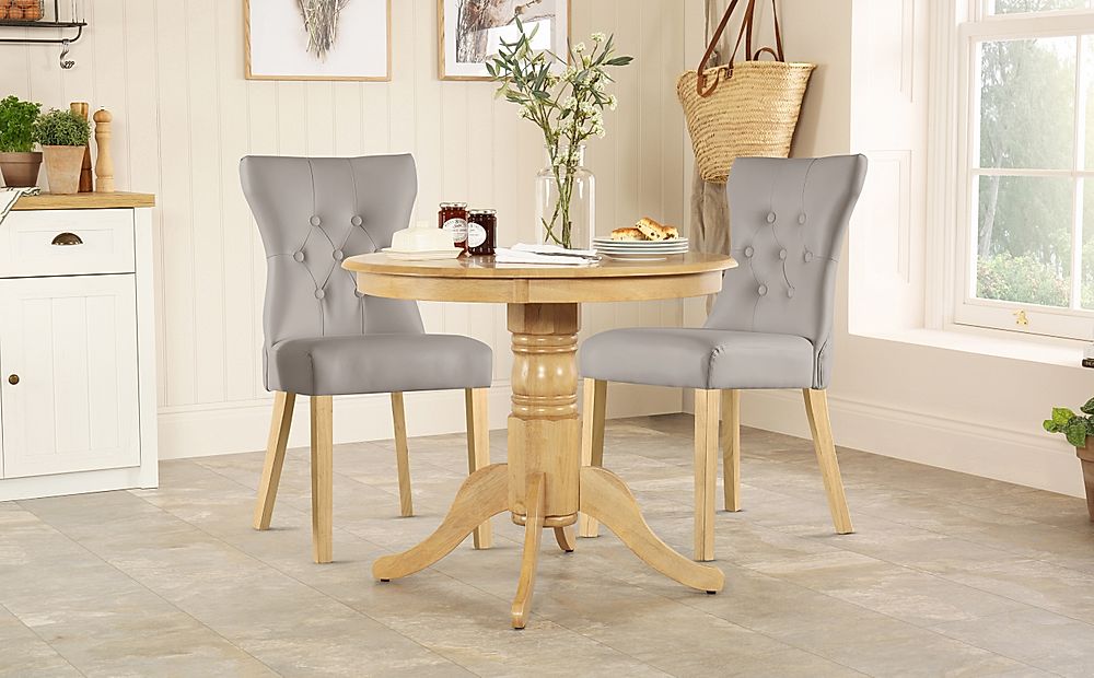 Kingston Round Dining Table & 2 Bewley Chairs, Natural Oak Finished Solid Hardwood, Stone Grey Classic Faux Leather, 90cm