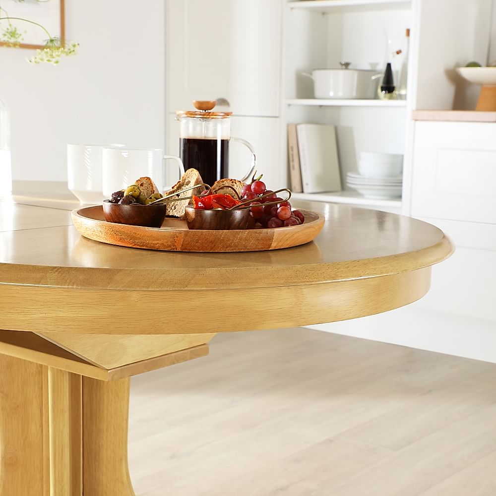 Extendable oak round dining table sales