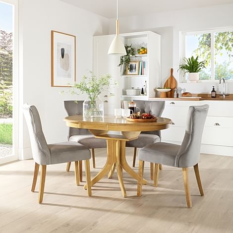 Hudson Round Oak Extending Dining Table with 4 Bewley Grey Velvet Chairs