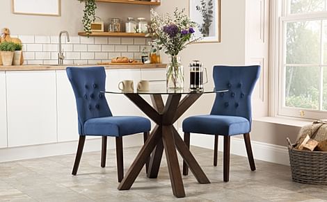 Hatton Round Dark Wood and Glass Dining Table with 2 Bewley Blue Velvet Chairs