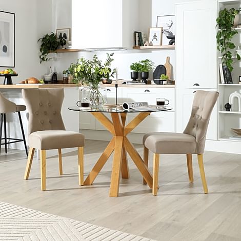 Hatton Round Dining Table & 2 Bewley Chairs, Glass & Natural Oak Finished Solid Hardwood, Champagne Classic Velvet, 100cm