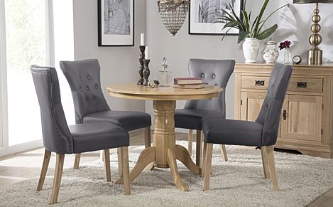 Kingston Round Oak Dining Table with 4 Bewley Grey Leather Chairs