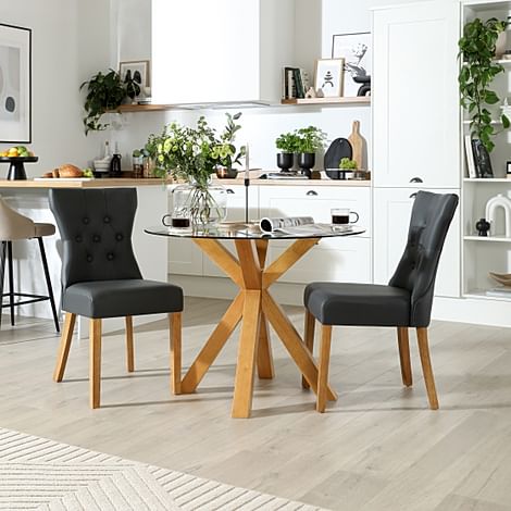 Hatton Round Dining Table & 2 Bewley Chairs, Glass & Natural Oak Finished Solid Hardwood, Grey Classic Faux Leather, 100cm