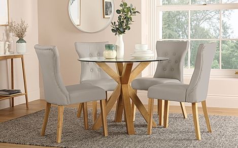 Hatton Round Oak and Glass Dining Table with 4 Bewley Stone Grey Leather Chairs