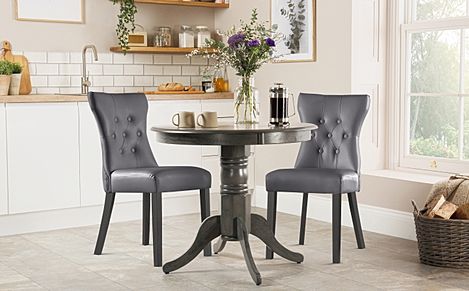 Kingston Round Grey Wood Dining Table with 2 Bewley Grey Leather Chairs