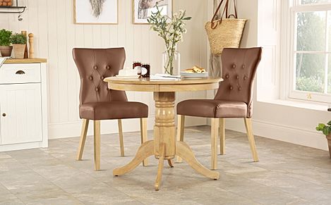Kingston Round Oak Dining Table with 2 Bewley Tan Leather Chairs