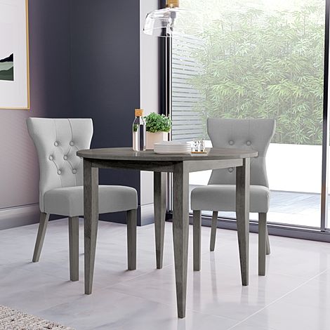 Finley Round Grey Wood Dining Table with 2 Bewley Light Grey Leather Dining Chairs