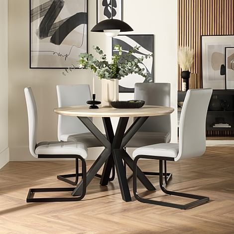 Newark Round Dining Table & 4 Perth Chairs, Light Oak Effect & Black Steel, Light Grey Classic Faux Leather, 110cm