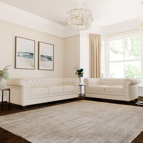 Ivory And Cream Faux Leather Sofas