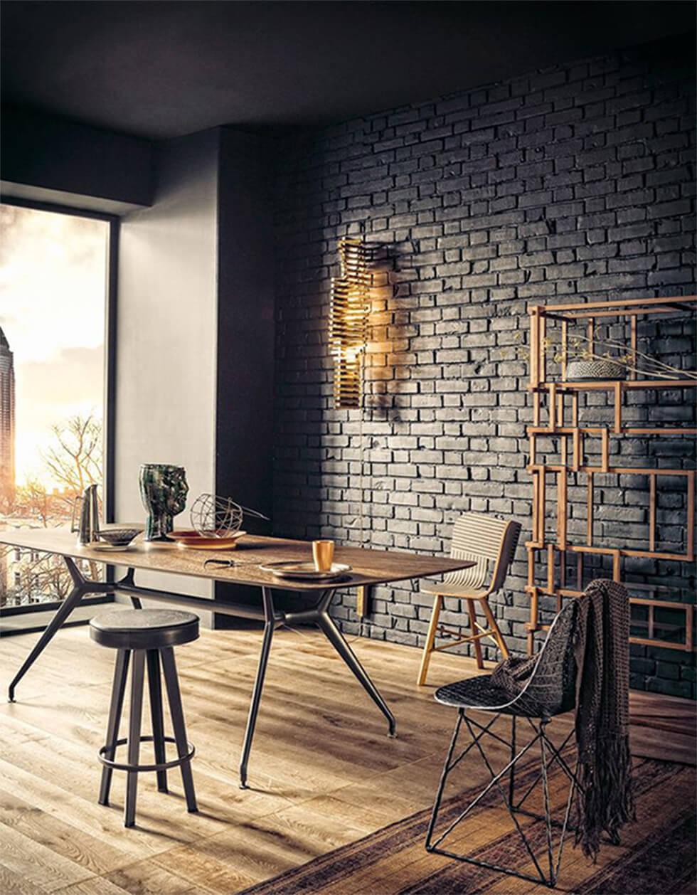 black brick wall in an industrial dining room