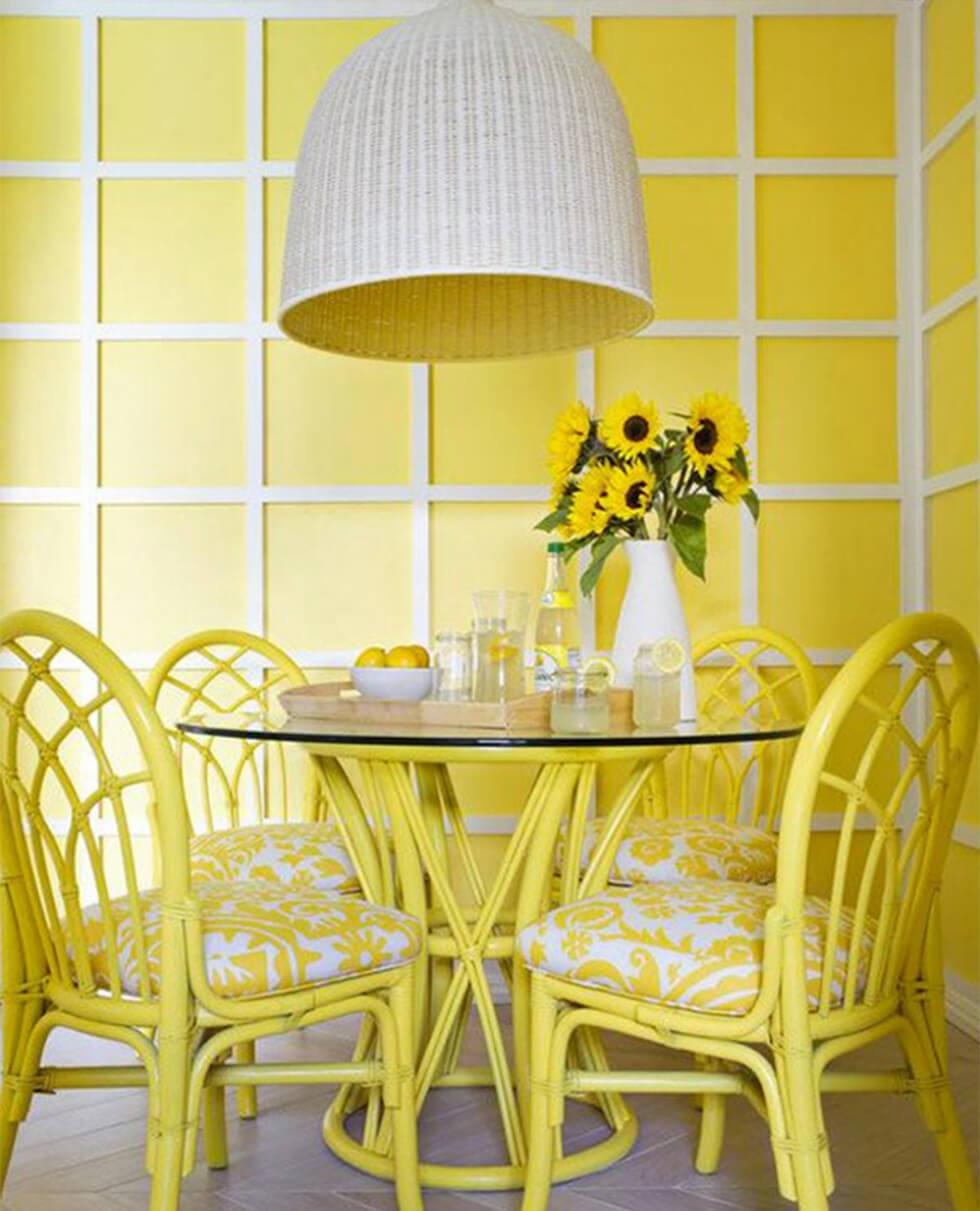 sunshine yellow patterned walls in a modern dining room
