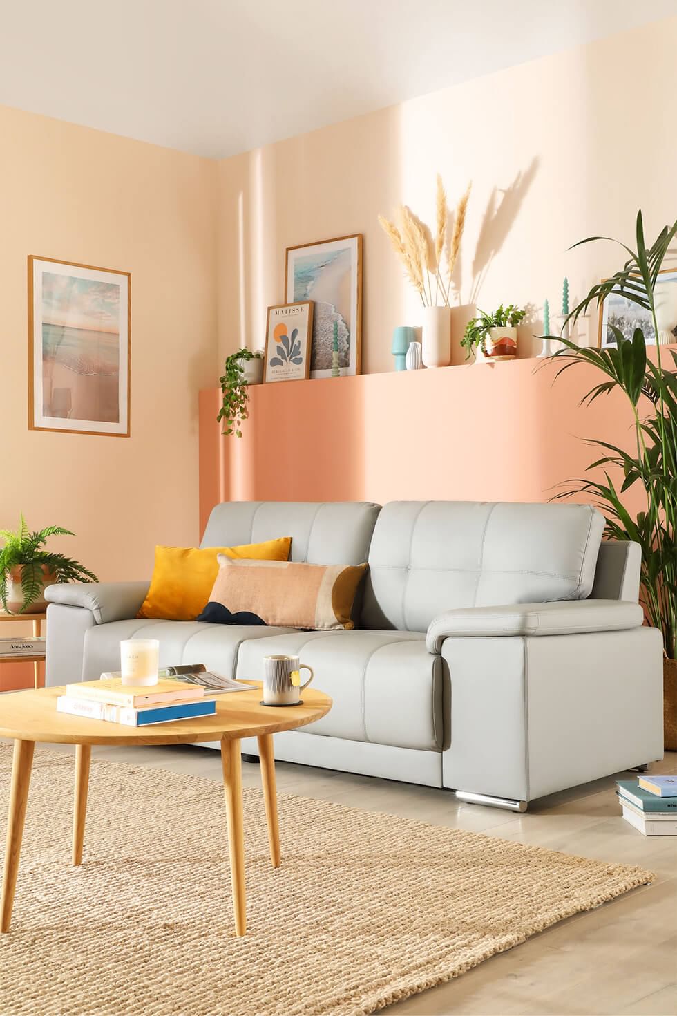 Living room feature wall painted in peach fuzz colour