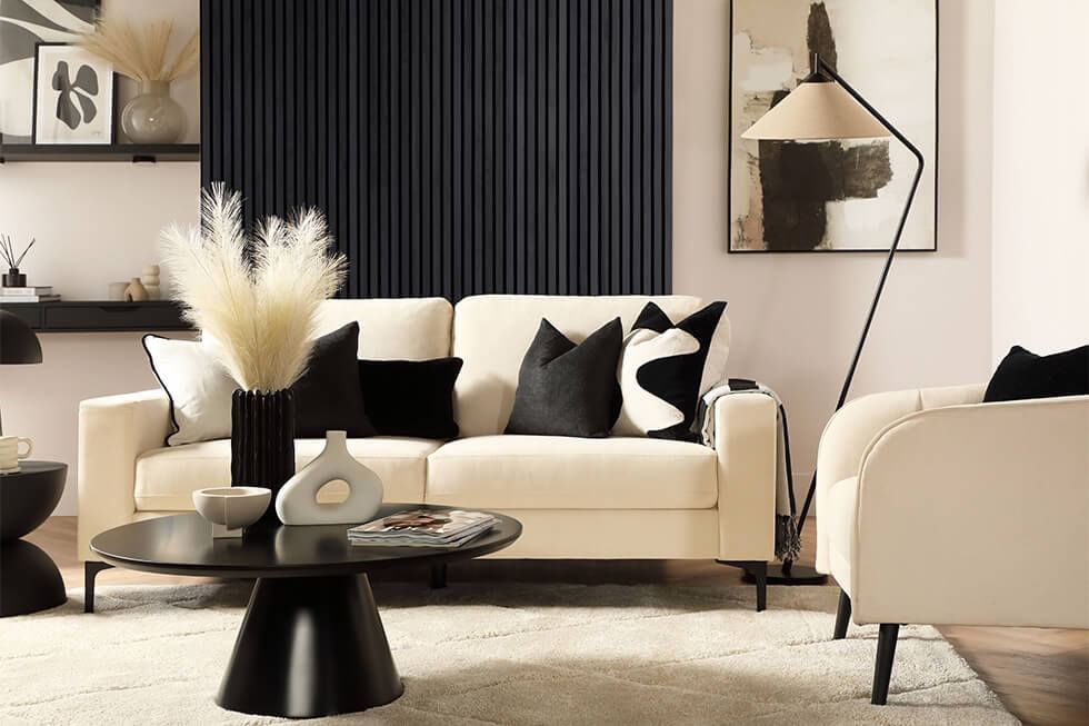 Living room with wooden slat panels painted in black