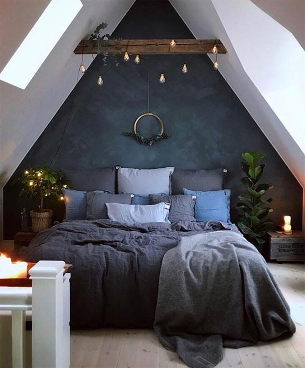 Navy blue loft bedroom with a strong mystical touch