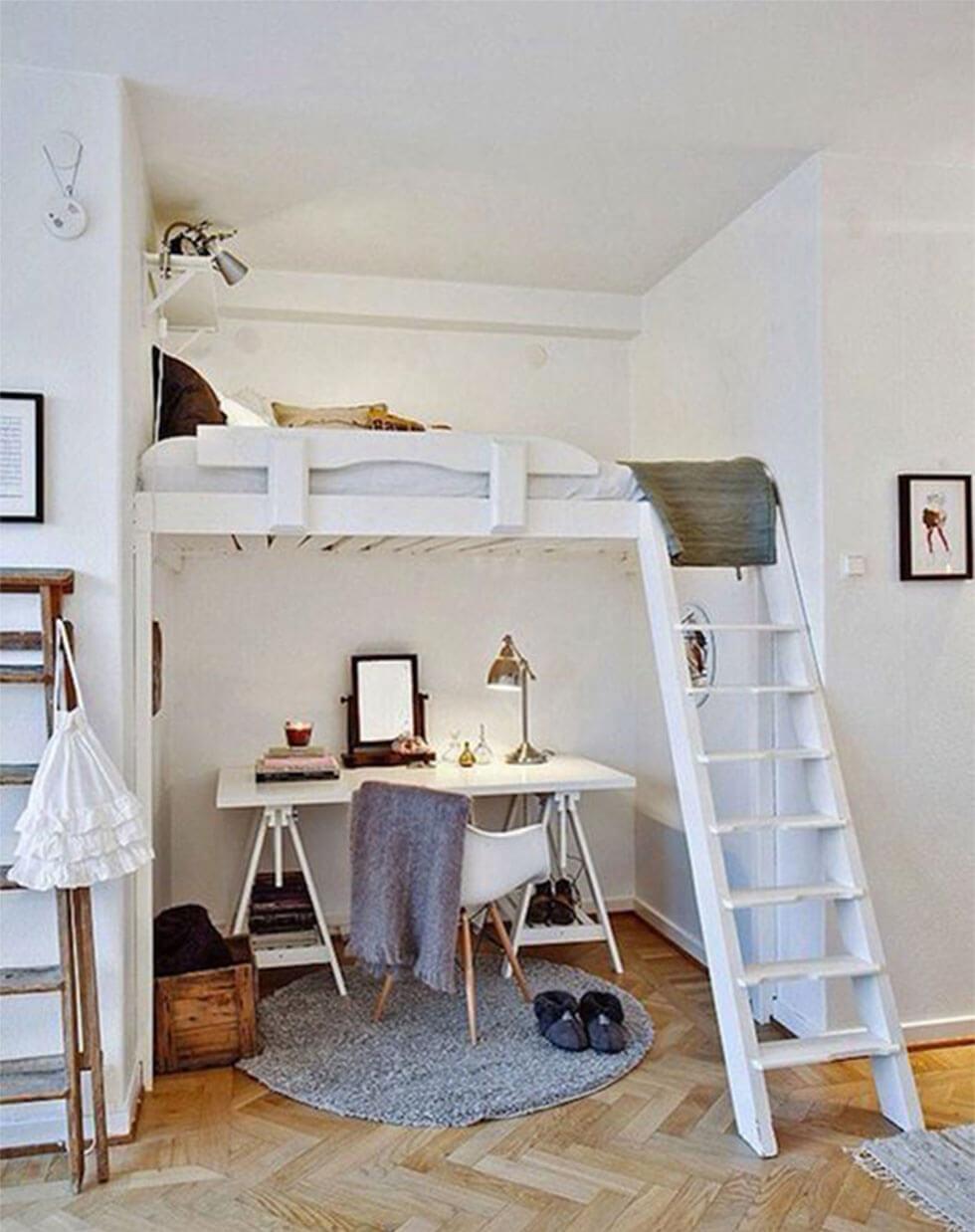 Loft bedroom with a white mezzanine bed