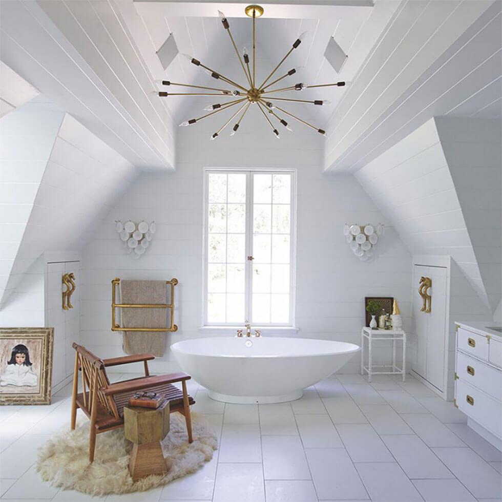 White loft bathroom with luxurious bathtub