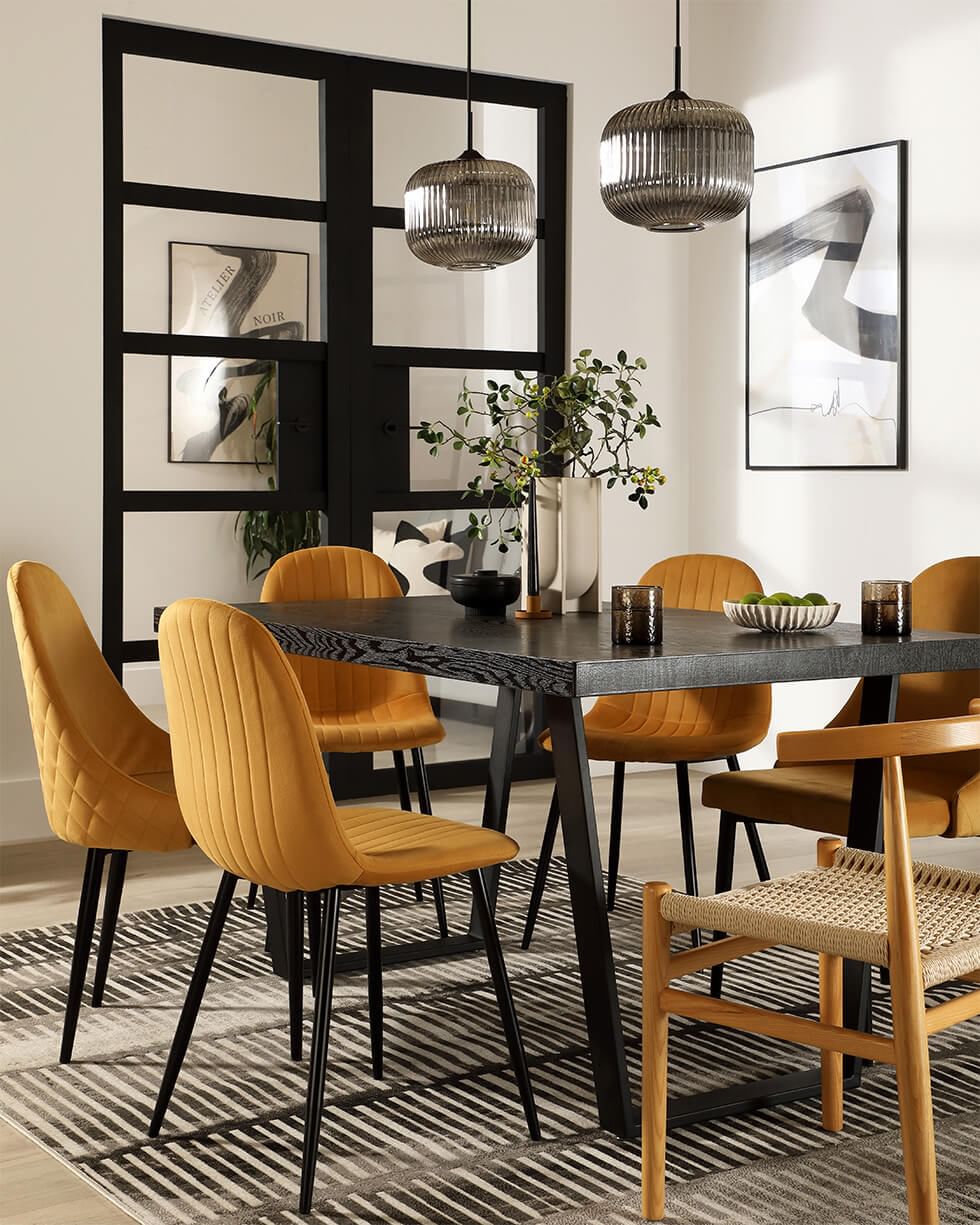 Modern dining table with mismatched dining chairs