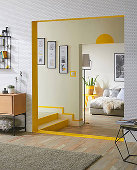 Home interior features like door arches and skirting boards accentuated with yellow paint