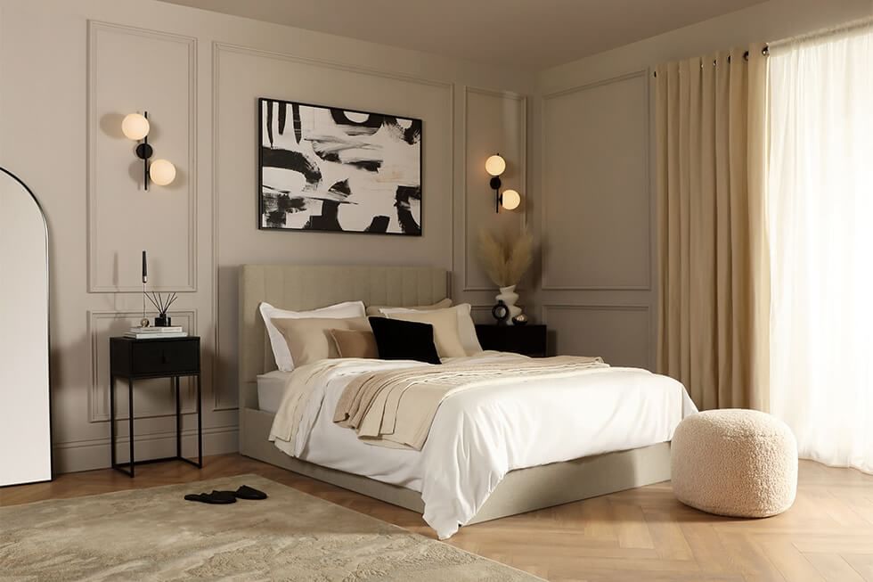 Comfy bed in a monochrome bedroom