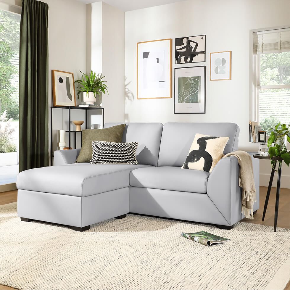 Neutral living room with grey sofa and patterns