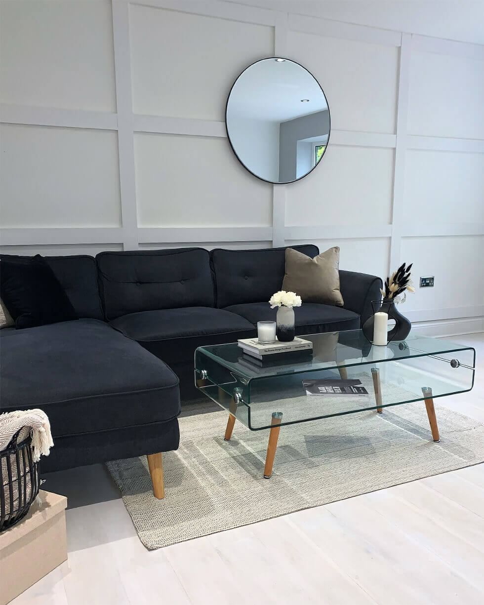 Neutral living room with wall panelling and grey sofa