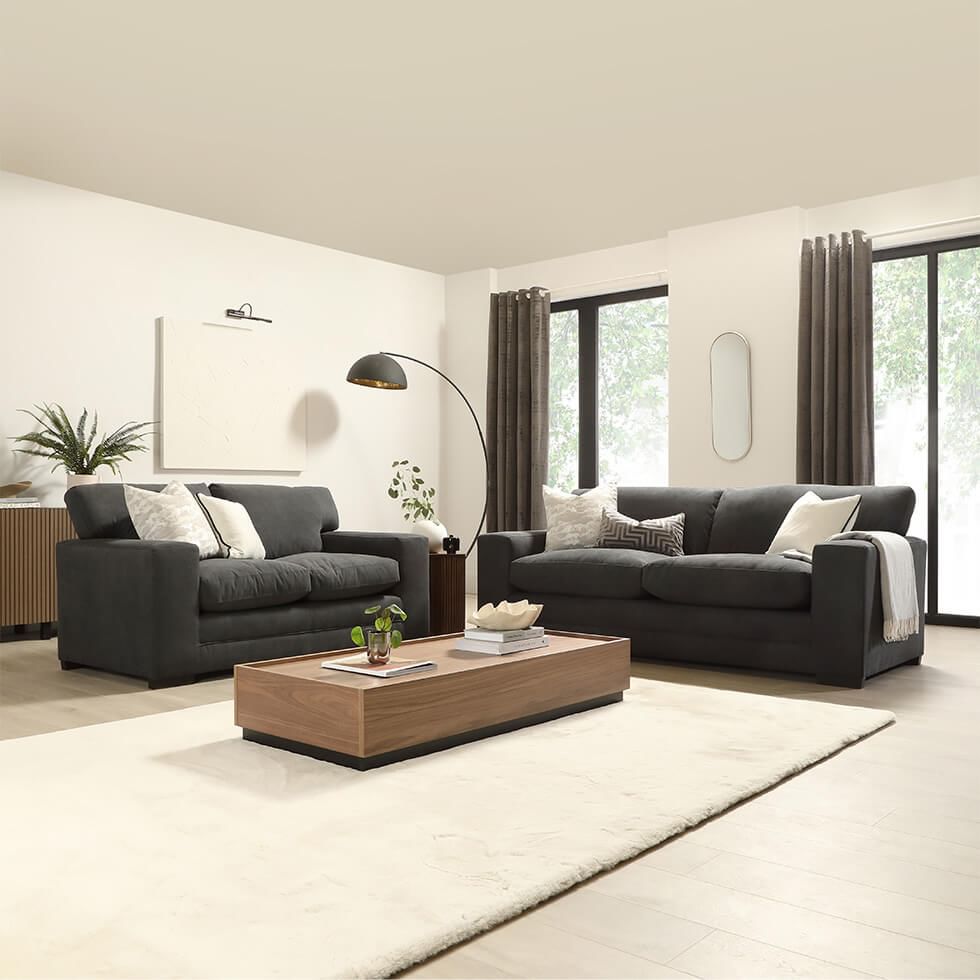 Japandi style living room with a dark grey sofa set