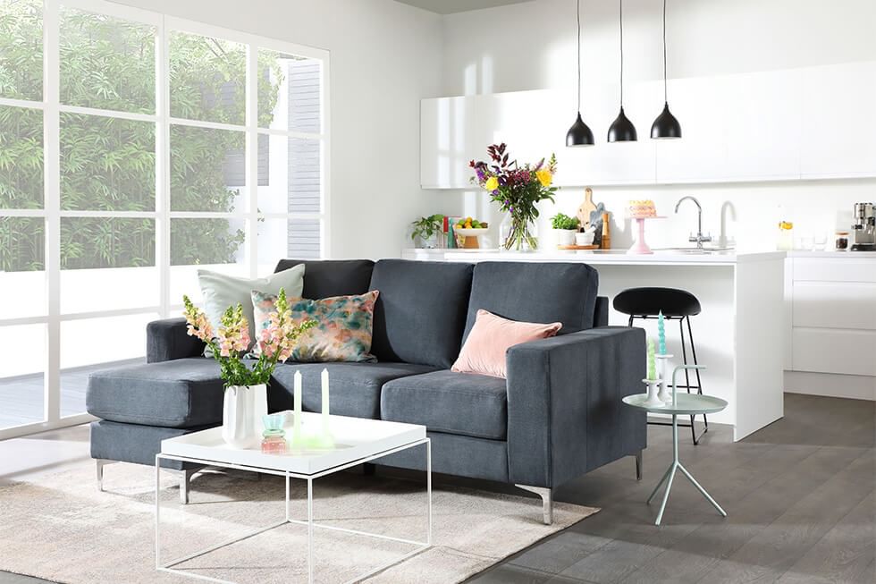 Scandinavian living room with a comfy L-shape sofa