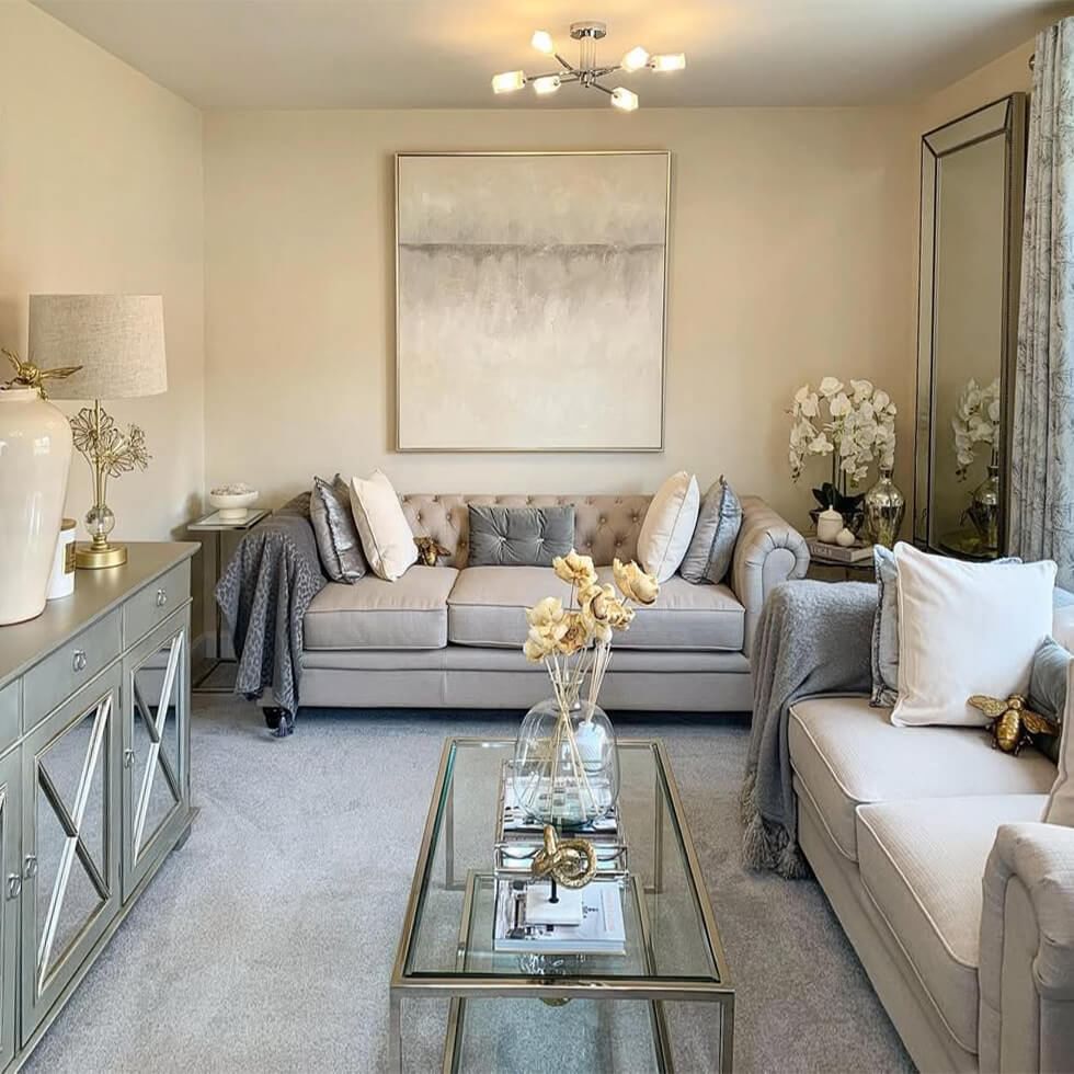 Beige living room with lots of metallic accents