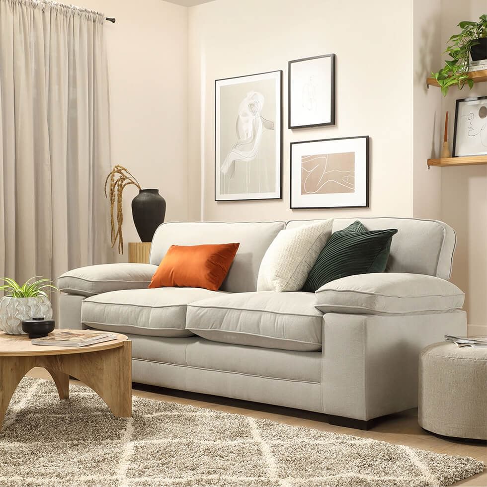 Cosy living room with neutral colours and a comfy sofa