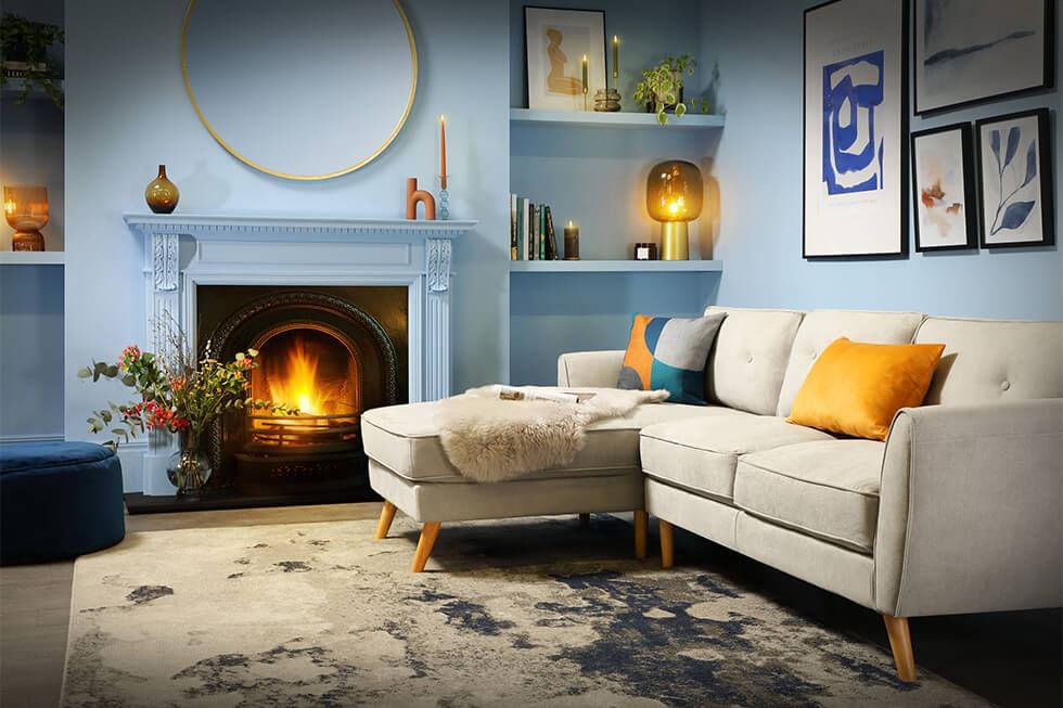 Cosy living room featuring a fireplace and L-shaped sofa