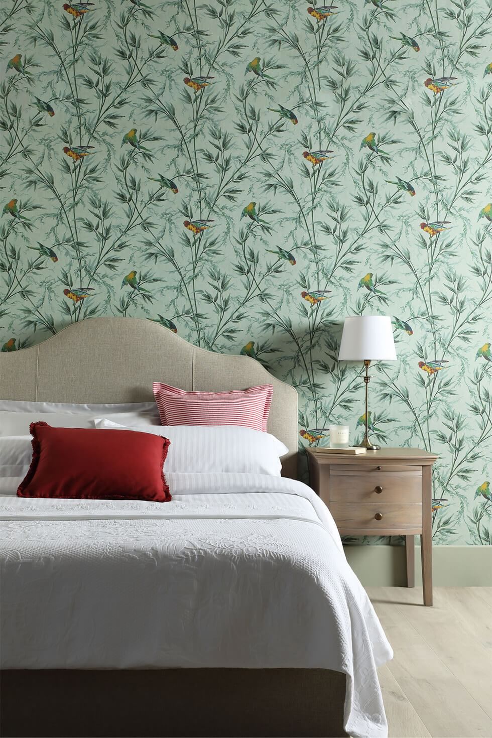Bedroom featuring bold maximalist wallpaper and a linen bed