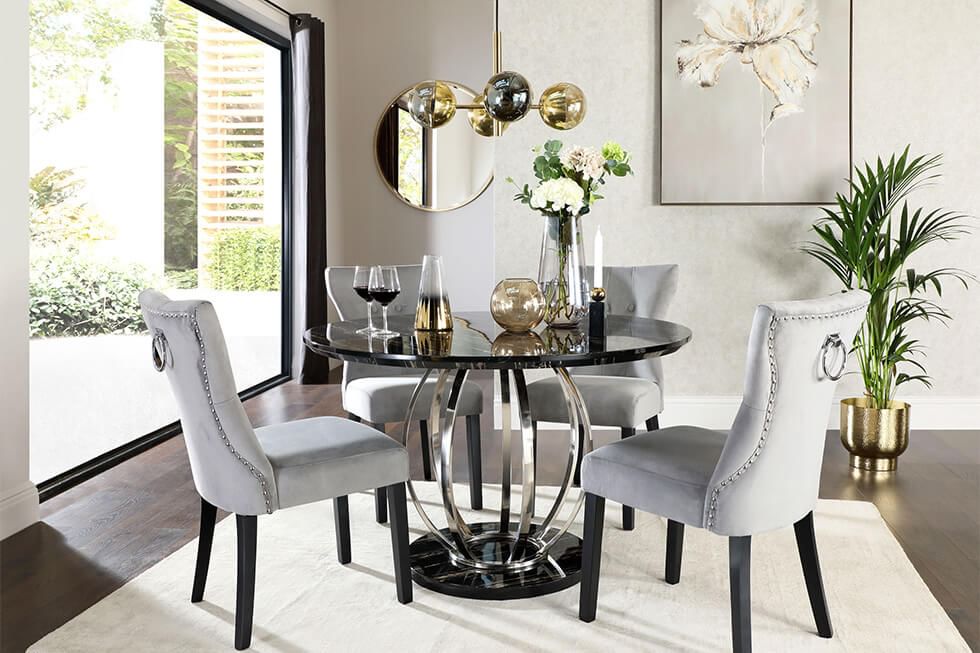 Black marble effect dining table with chrome legs and velvet dining chairs