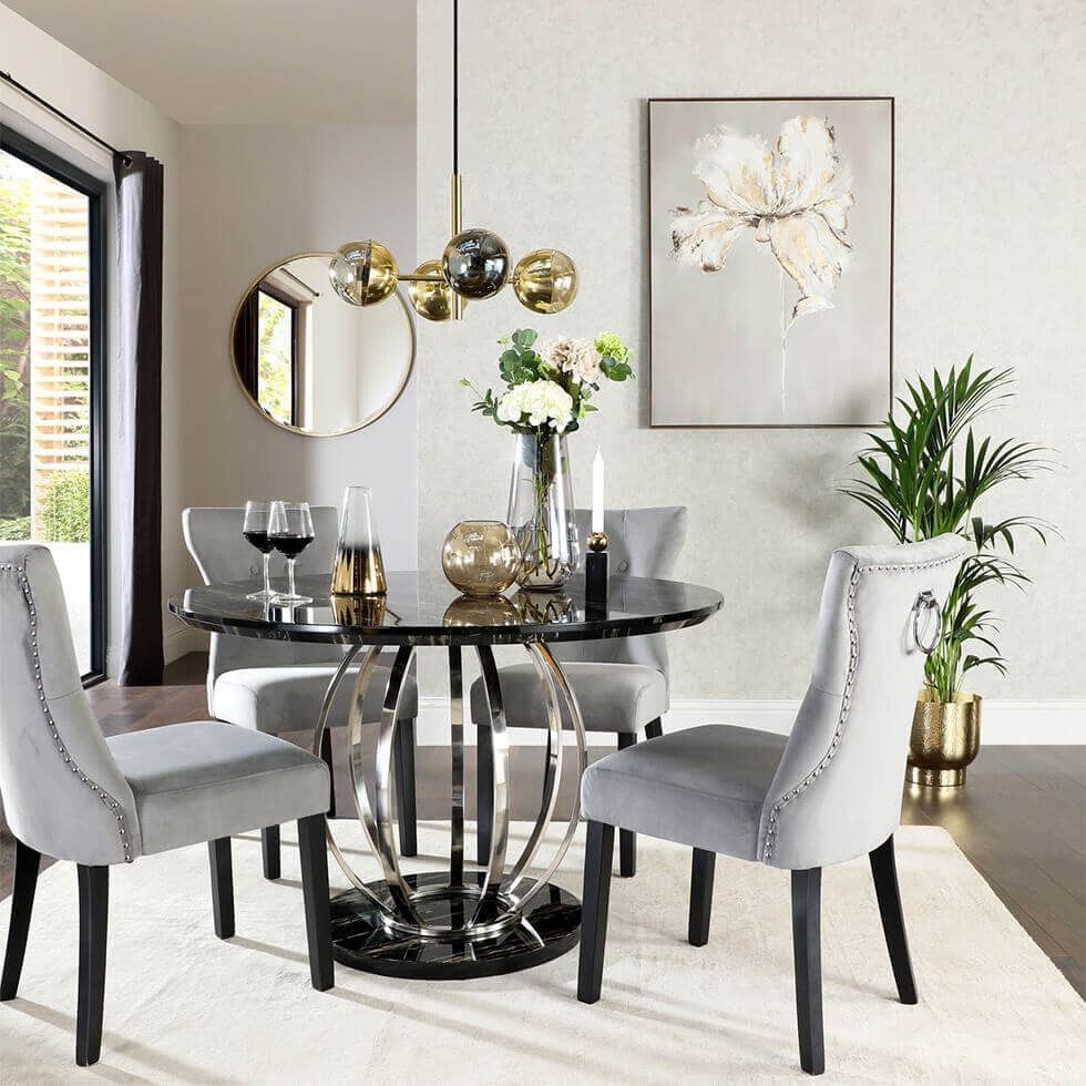 Black marble effect dining table with chrome legs and velvet dining chairs