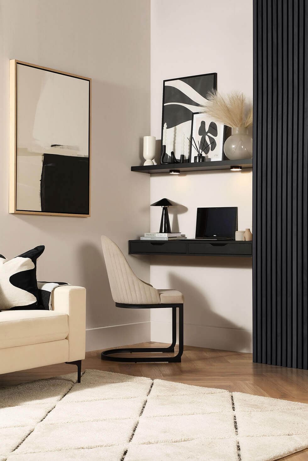 White living room with feature wall and artwork