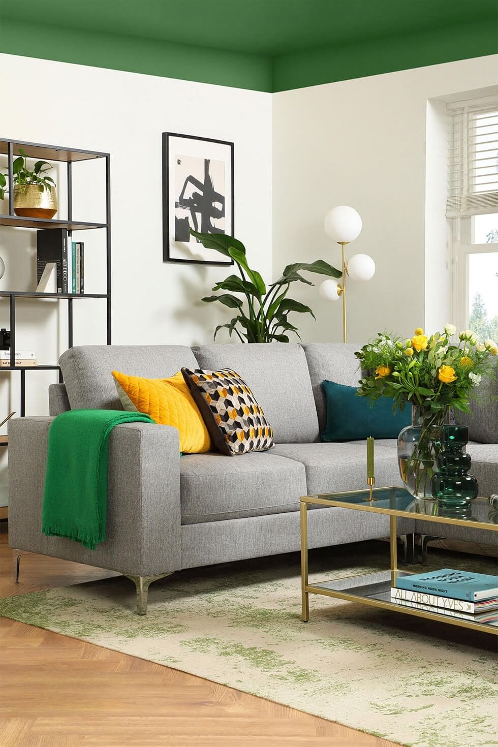 Modern living room with a painted ceiling and corner sofa