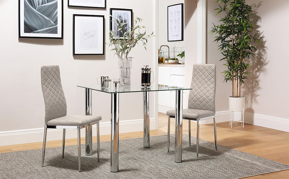 Square dining table set with rug under dining table