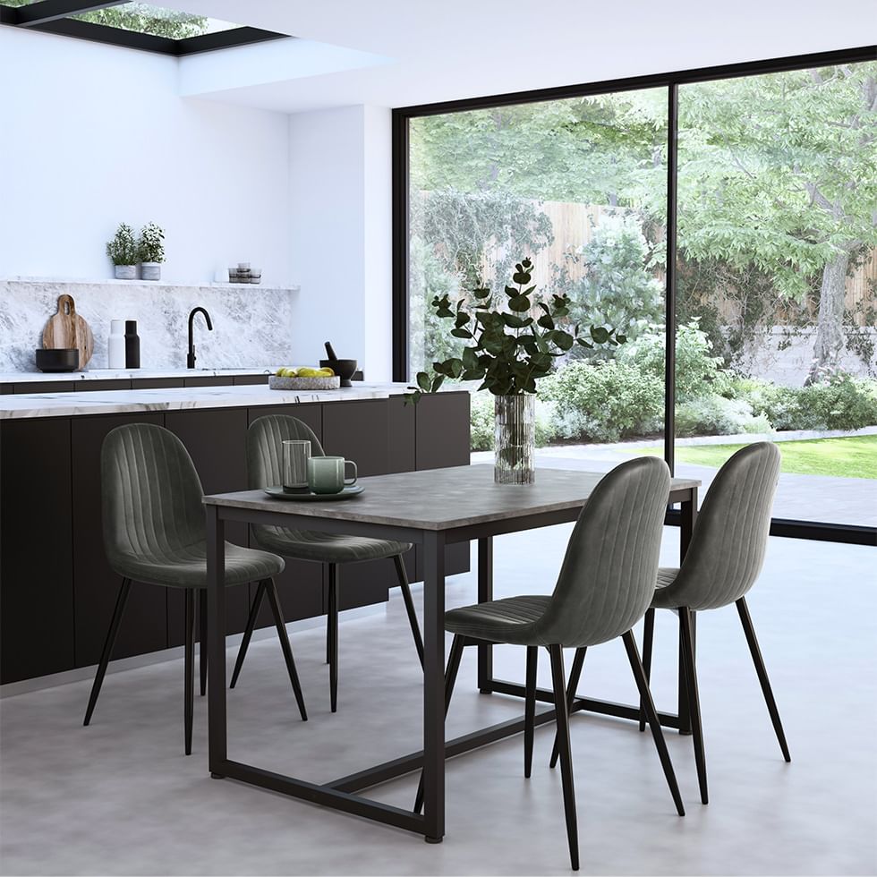 Small dining set in open plan layout with natural lighting