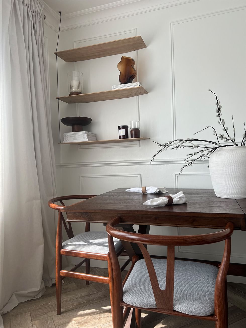 Small dining room with open shelving