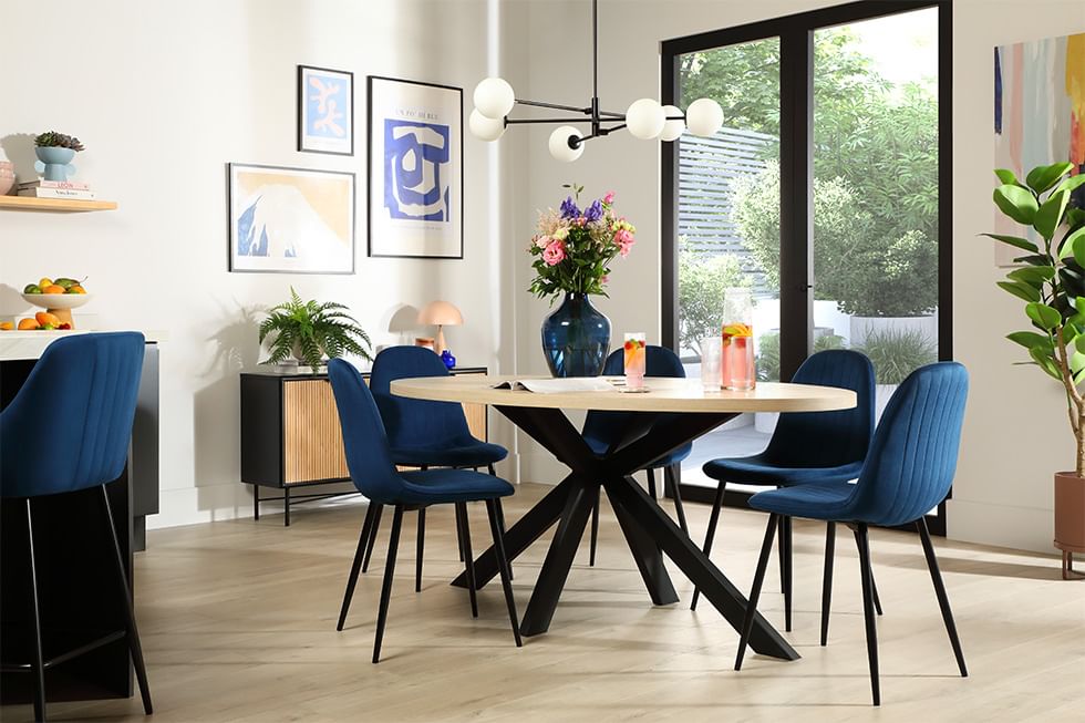 Stylish small dining area with blue accents