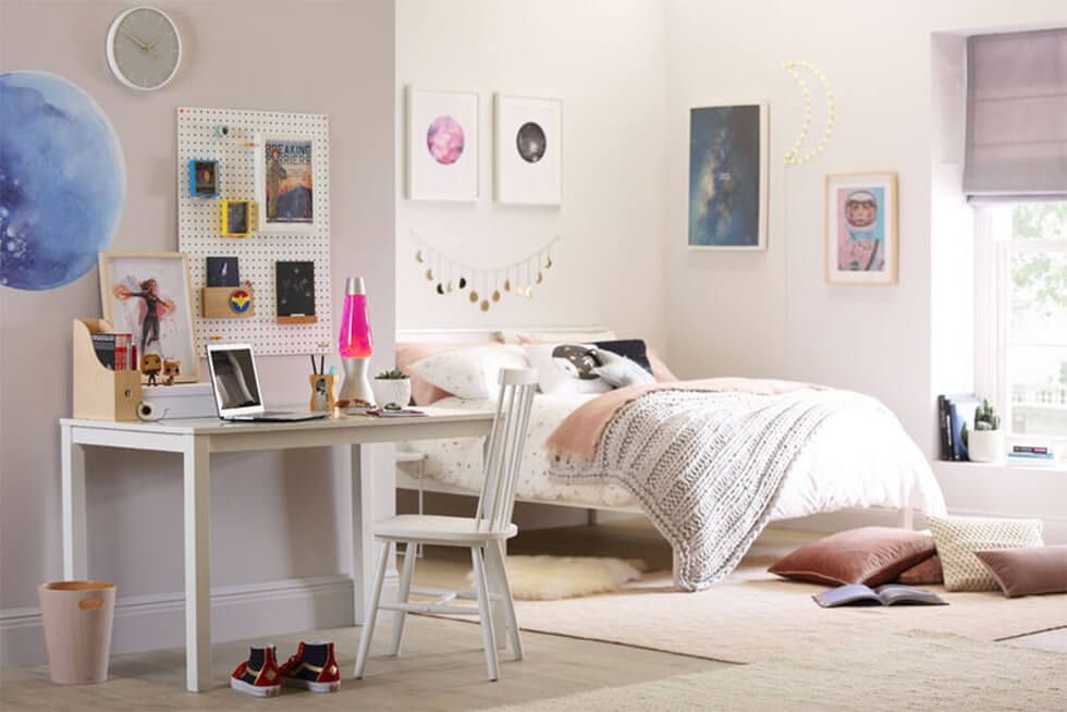 Light-hearted space-themed bedroom for teenage girls
