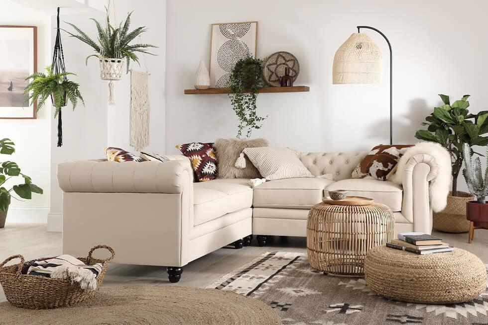  Ivory leather corner sofa in a neutral modern boho space